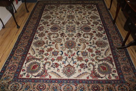 A Isfahan style ivory ground carpet, 10ft 10in by 7ft 8in.